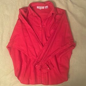 Long sleeve button down shirt. Burnt orange